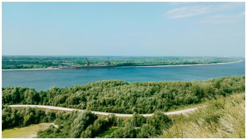 Aerial view of a serene river landscape with lush