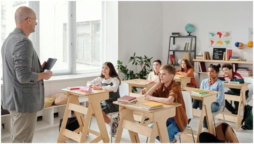 A teacher conducting a lesson in a diverse, engagi