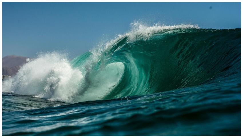 A stunning view of a powerful ocean wave crashing