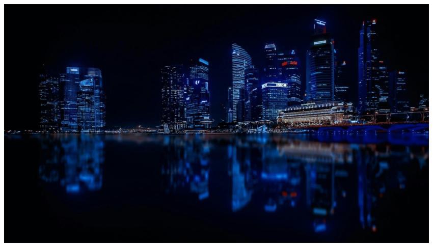 A stunning night view of a city skyline with illum