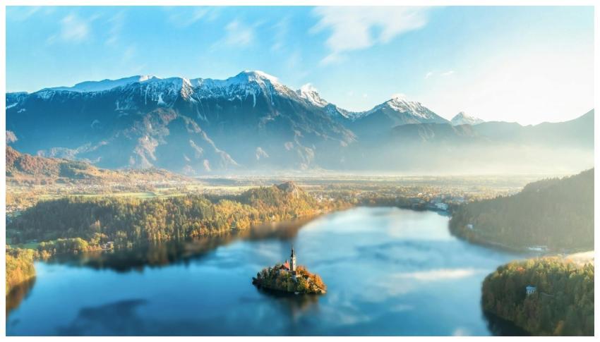Majestic Lake Bled with church on island, surround