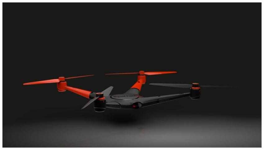 Red and black drone captured mid-flight against a