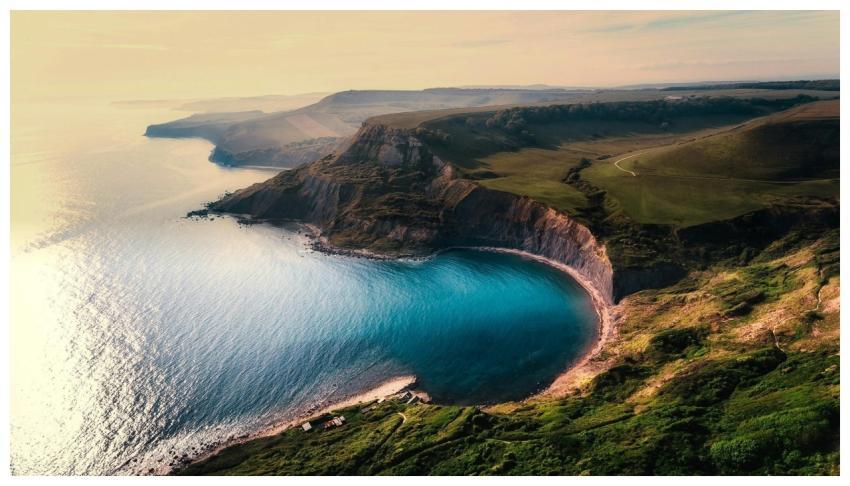A breathtaking aerial view of coastal cliffs with