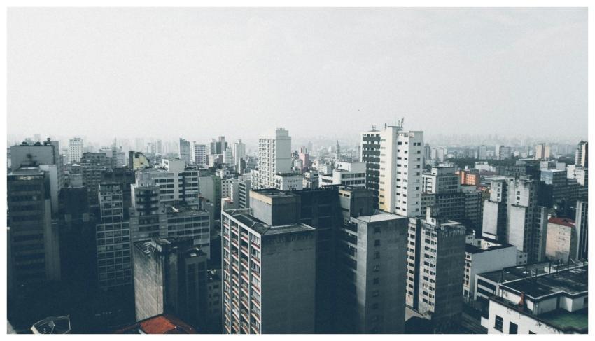 Aerial view of a dense urban cityscape with numero