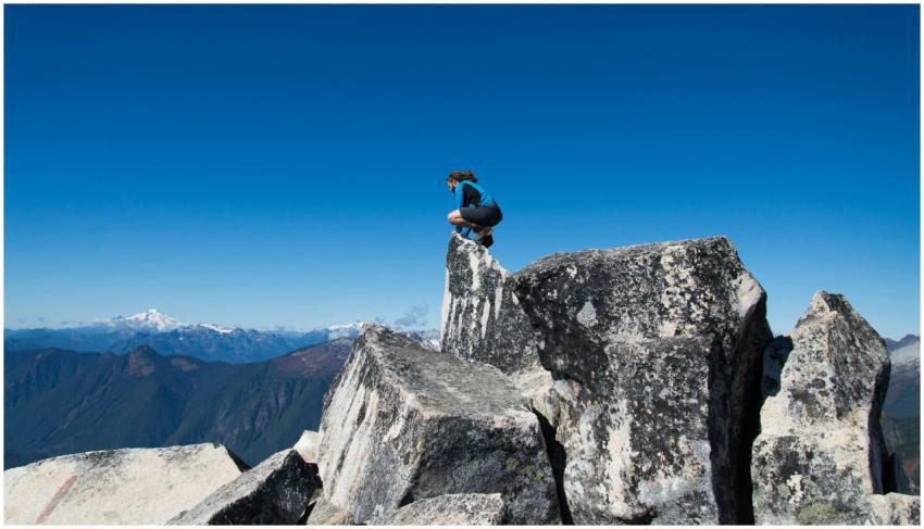 Man enjoying a thrilling moment at the peak of a m