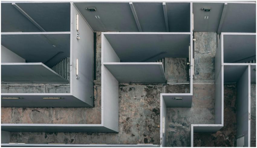 Aerial view of a complex indoor labyrinth made of