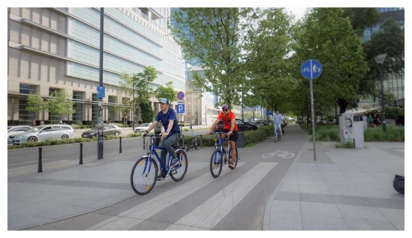 Bicyclists Bike Lane Crossing Street