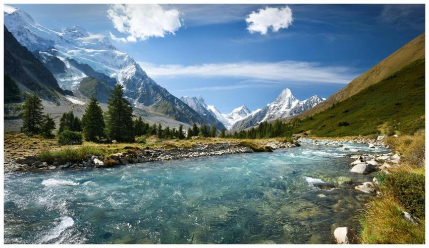 Stunning mountain view with clear river, snow-capp