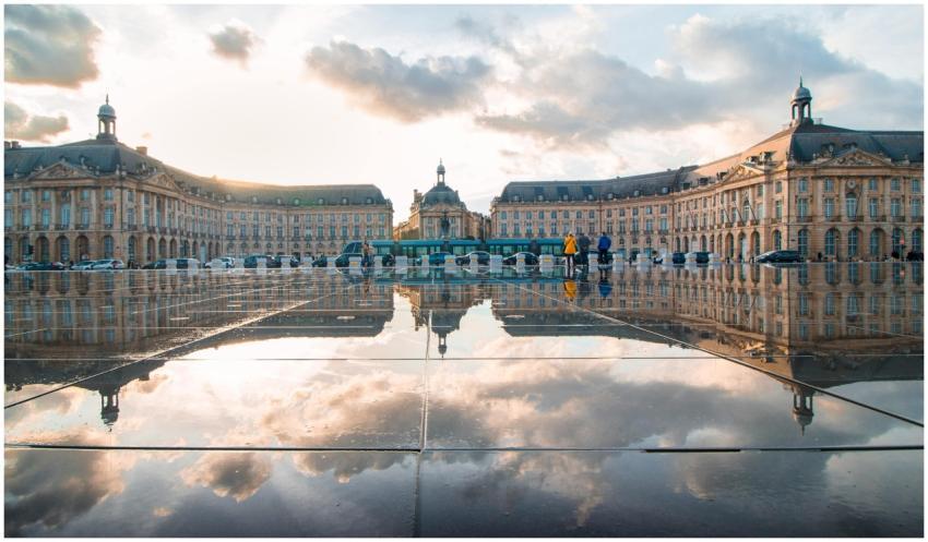 Breathtaking sunset reflection at Place de la Bour