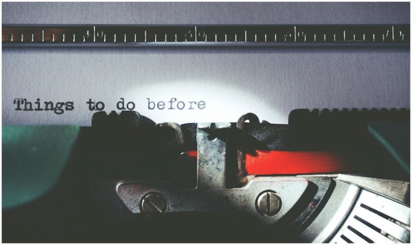 Close-up of a vintage typewriter typing 'Things to