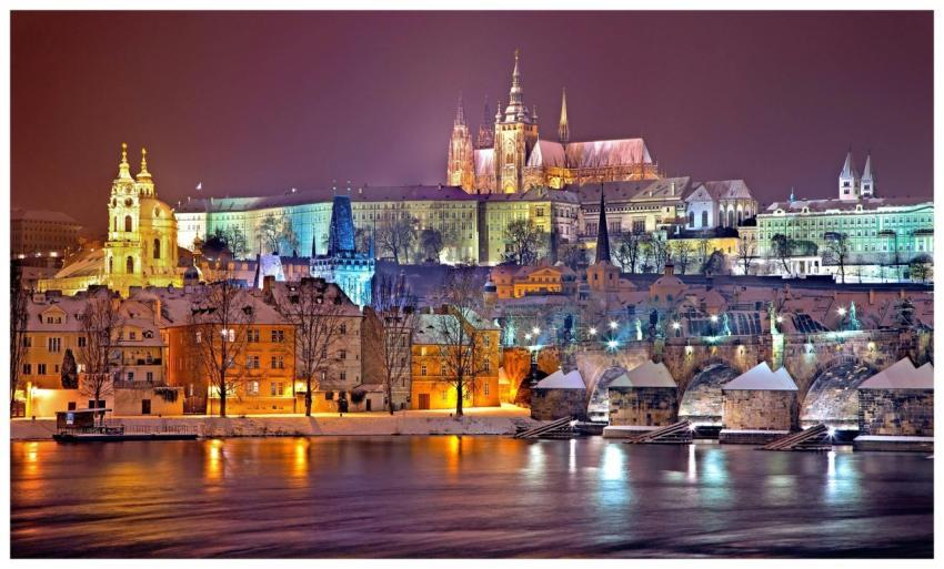 Illuminated Prague Castle and Vltava River at nigh