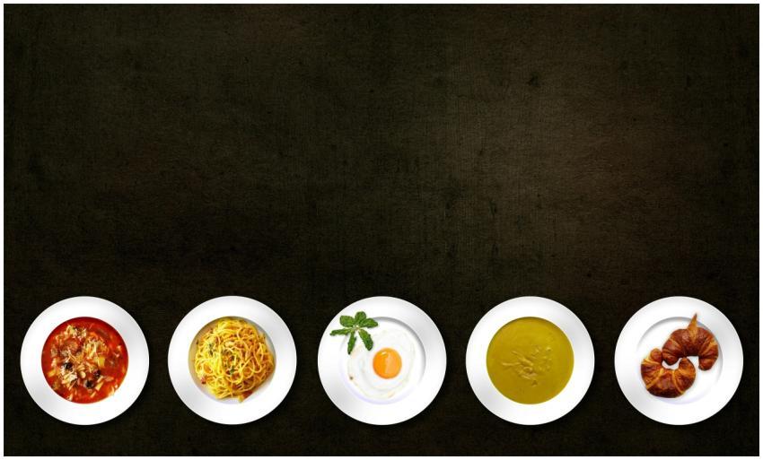 Flatlay of various dishes including pasta, egg, so