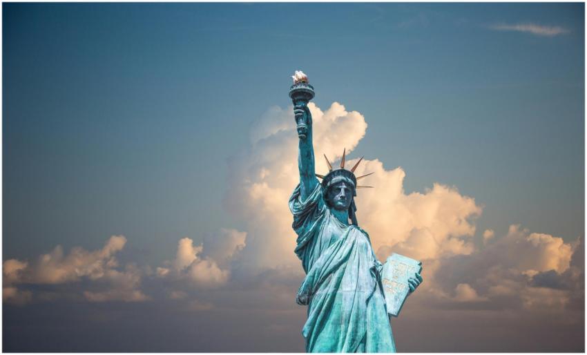 Iconic Statue of Liberty with majestic clouds in N