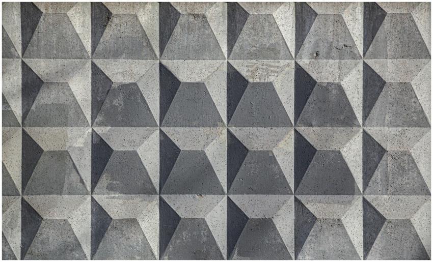 Close-up of a textured geometric concrete wall wit