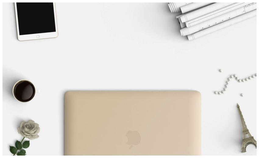 Elegant flat lay of a workspace featuring a laptop