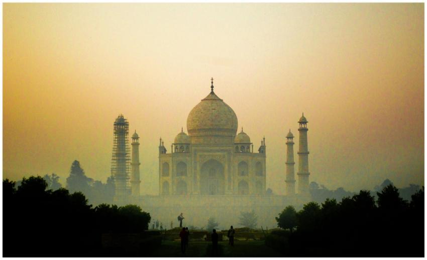 Misty view of the iconic Taj Mahal at sunrise, Agr