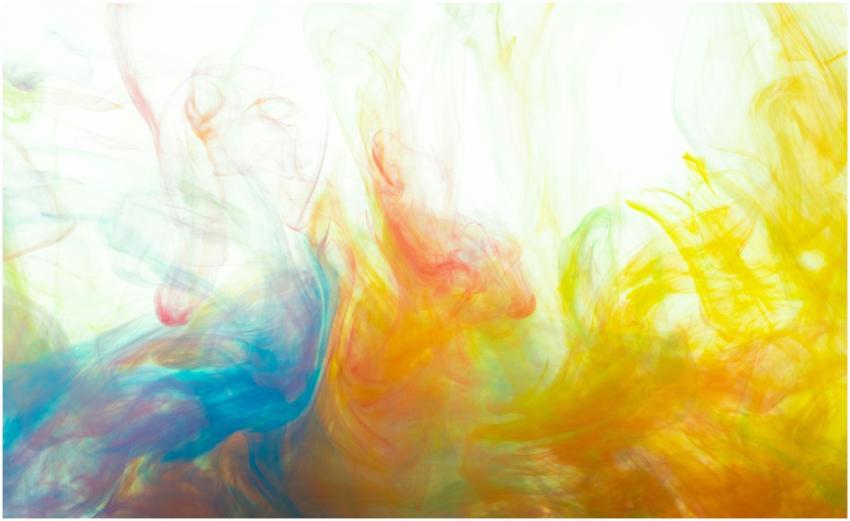 Dynamic abstract image featuring vibrant ink swirl