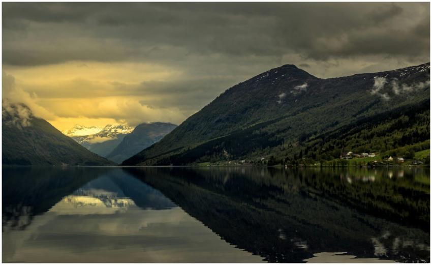Captivating view of a Norwegian fjord reflecting m