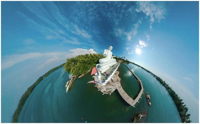 A stunning 360-degree aerial view of a Buddha stat