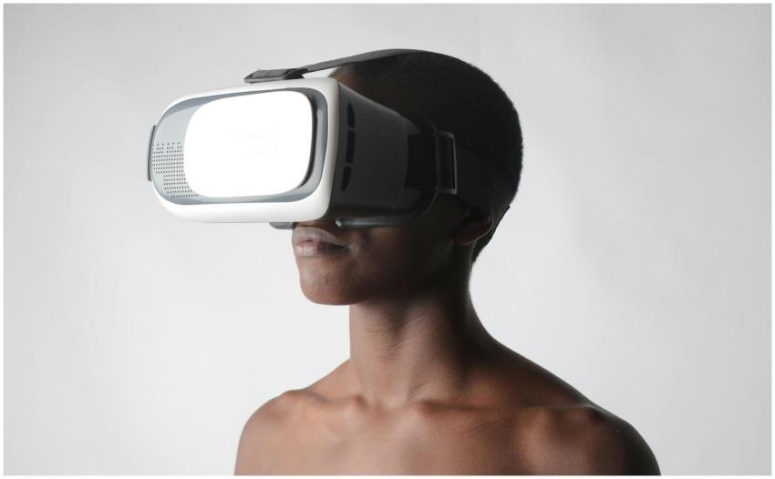 Close-up of a person using VR goggles, showcasing