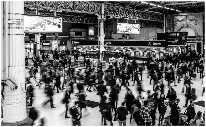 Dynamic black and white image capturing a busy tra