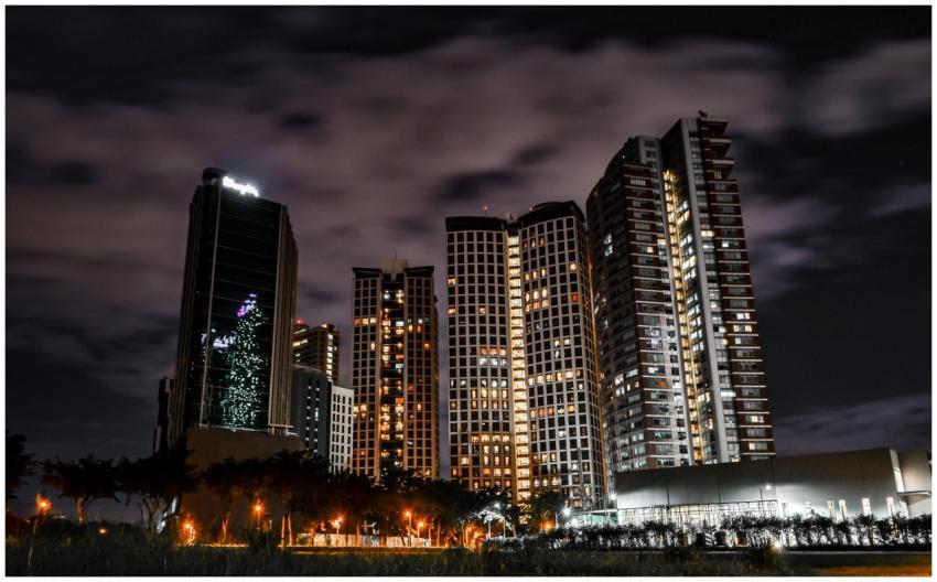 Majestic city skyline with illuminated skyscrapers