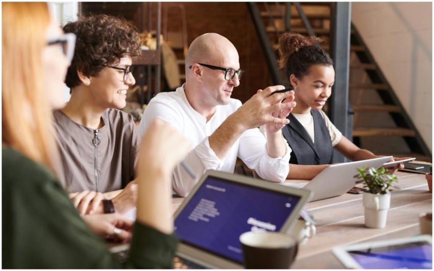 A diverse group of professionals engaging in a col