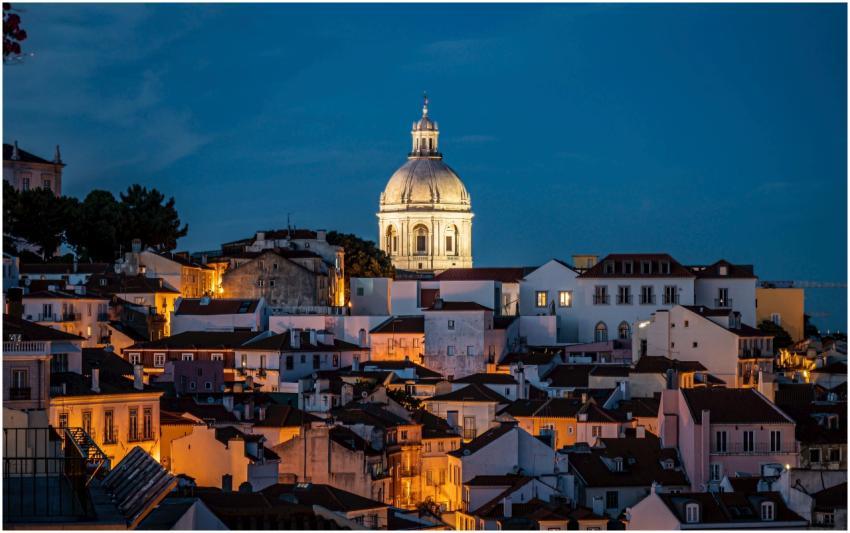 Discover the enchanting night skyline of Lisbon, f
