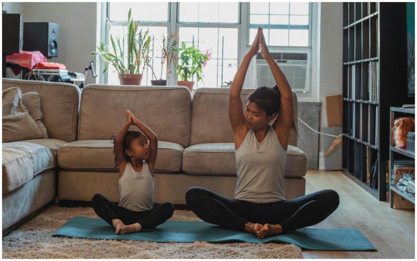 Full body content fit Asian woman and daughter in