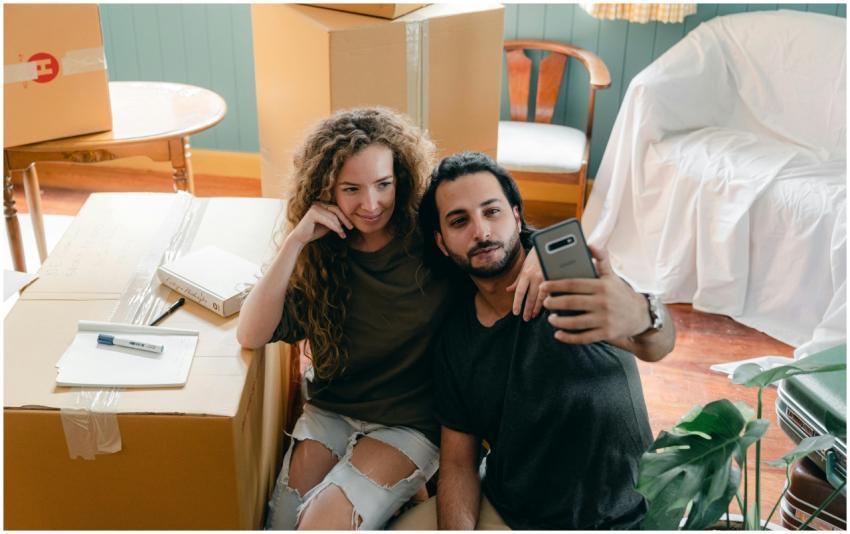 From above of positive young diverse couple in cas