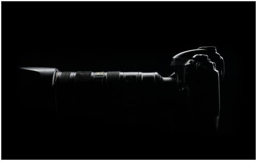 Artistic side profile of a DSLR camera with lens i