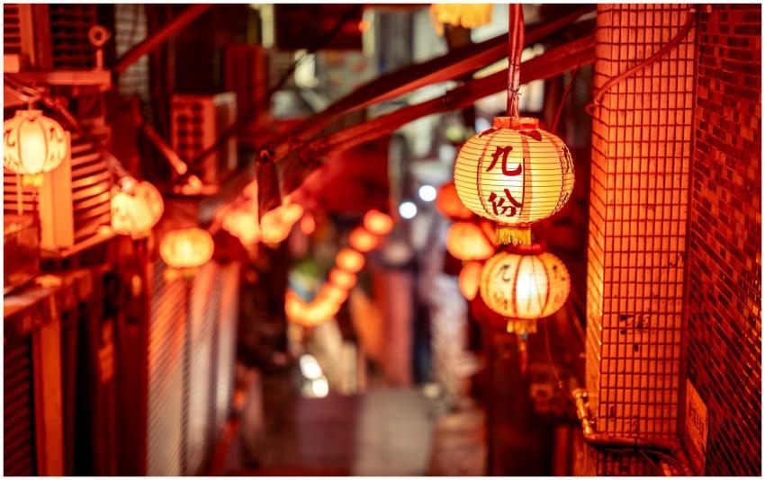 Vibrant night scene of a narrow street in Taipei a