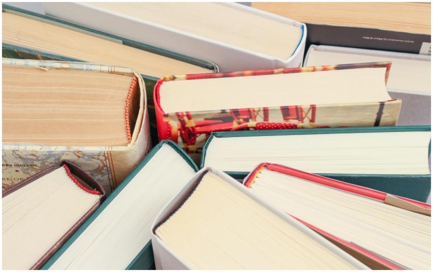 A vibrant collection of hardcover books with color