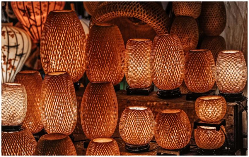 A collection of handmade woven lamps with warm glo