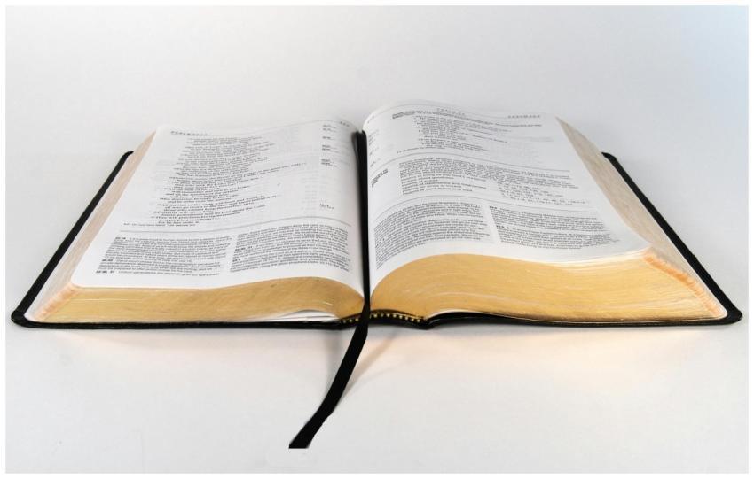 Elegant hardcover book open to a page, ideal for e