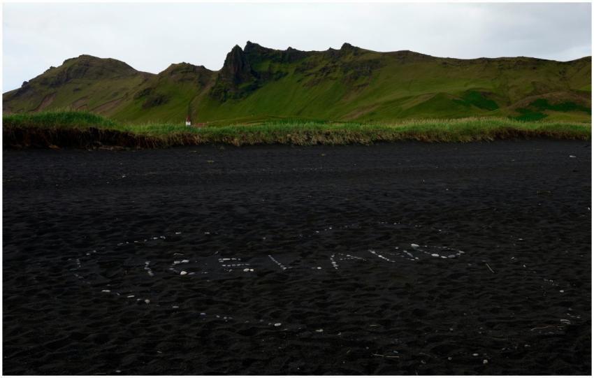 A stunning view of Vík í Mýrdal's volcanic sand wi