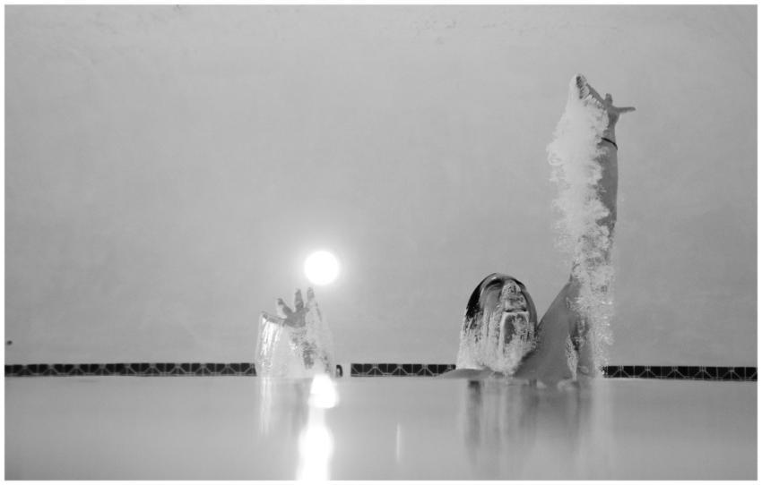 Captivating black and white photo of a swimmer eme