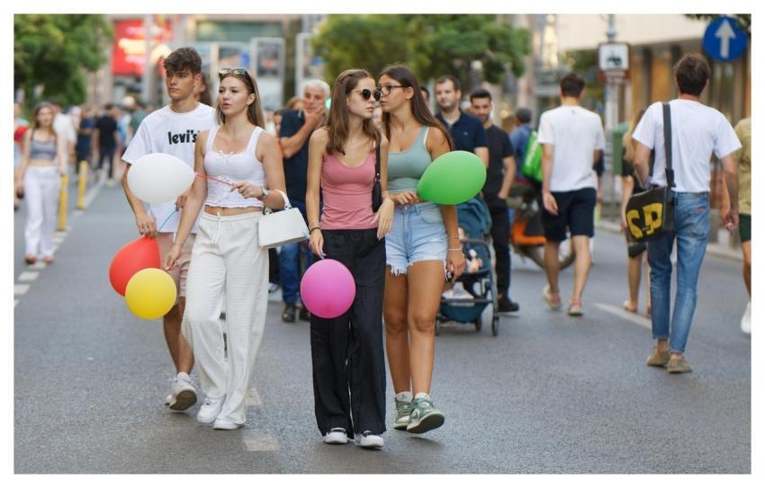 People Walking Promenade Balloons