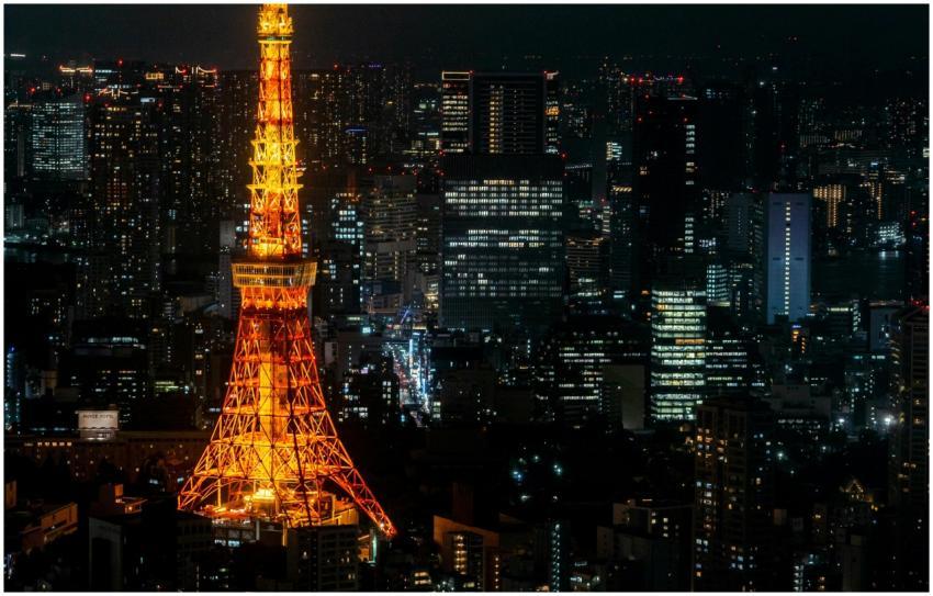 A stunning night view of Tokyo Tower glowing amids