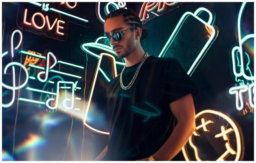 Cool urban portrait of a man wearing sunglasses an