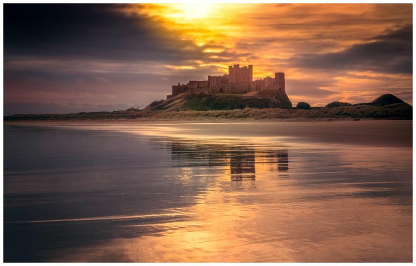 Stunning view of a castle reflecting on the tranqu
