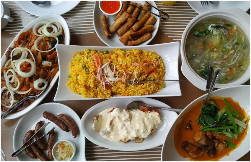 A vibrant top view of assorted Asian dishes includ
