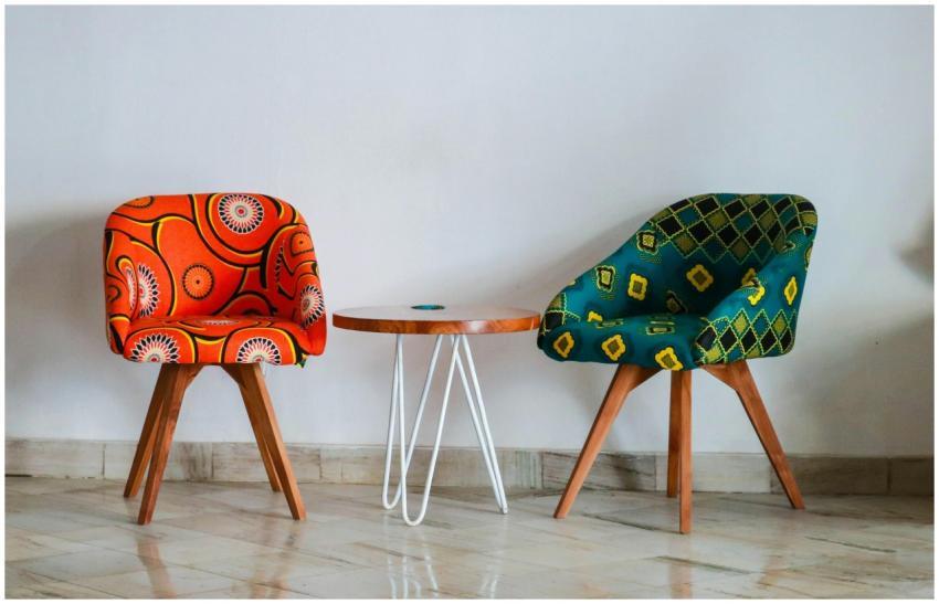 Brightly colored modern chairs and table in a mini