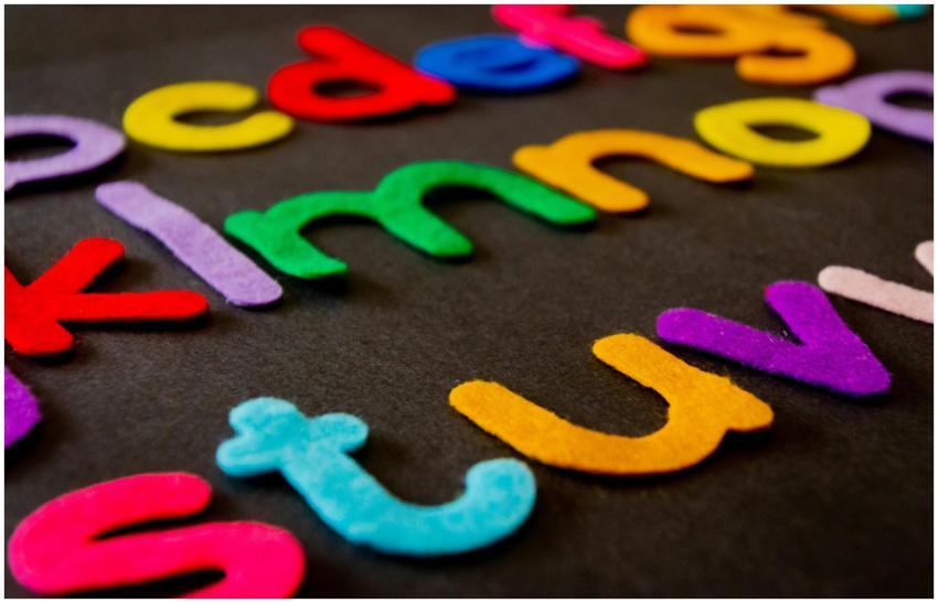 Bright and colorful felt alphabet letters arranged