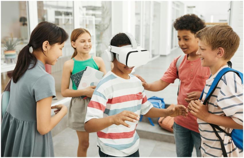 Diverse group of kids interacting with VR headset