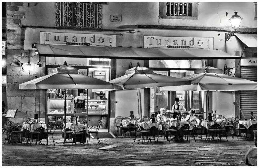 Black and white street view of Turandot Cafe in It