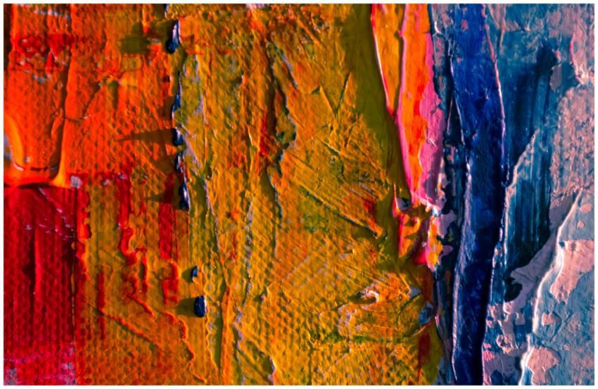 Close-up of vibrant abstract acrylic paint texture