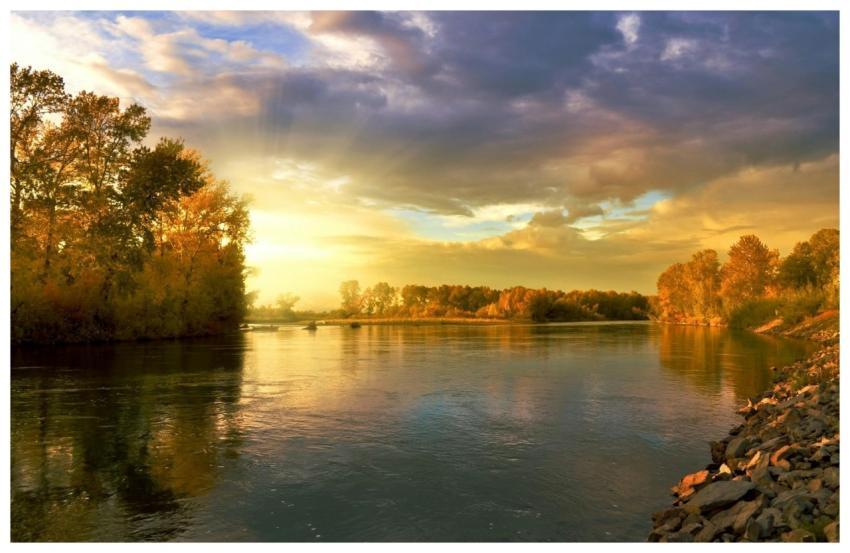 Beautiful river scene at golden hour with vibrant