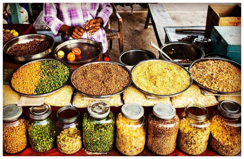 Colorful display of spices and legumes in a tradit