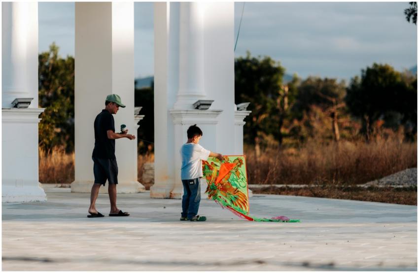 Father Son Playing Kite